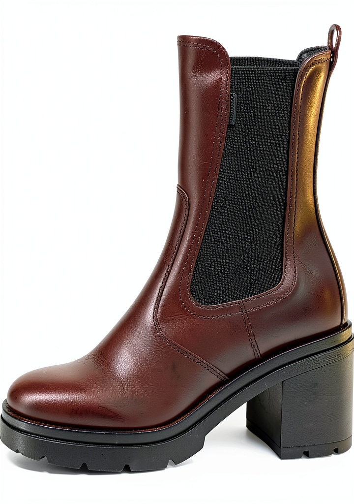 B.A.G. Damen-Stiefel in Schwarz auf einem Holzfußboden